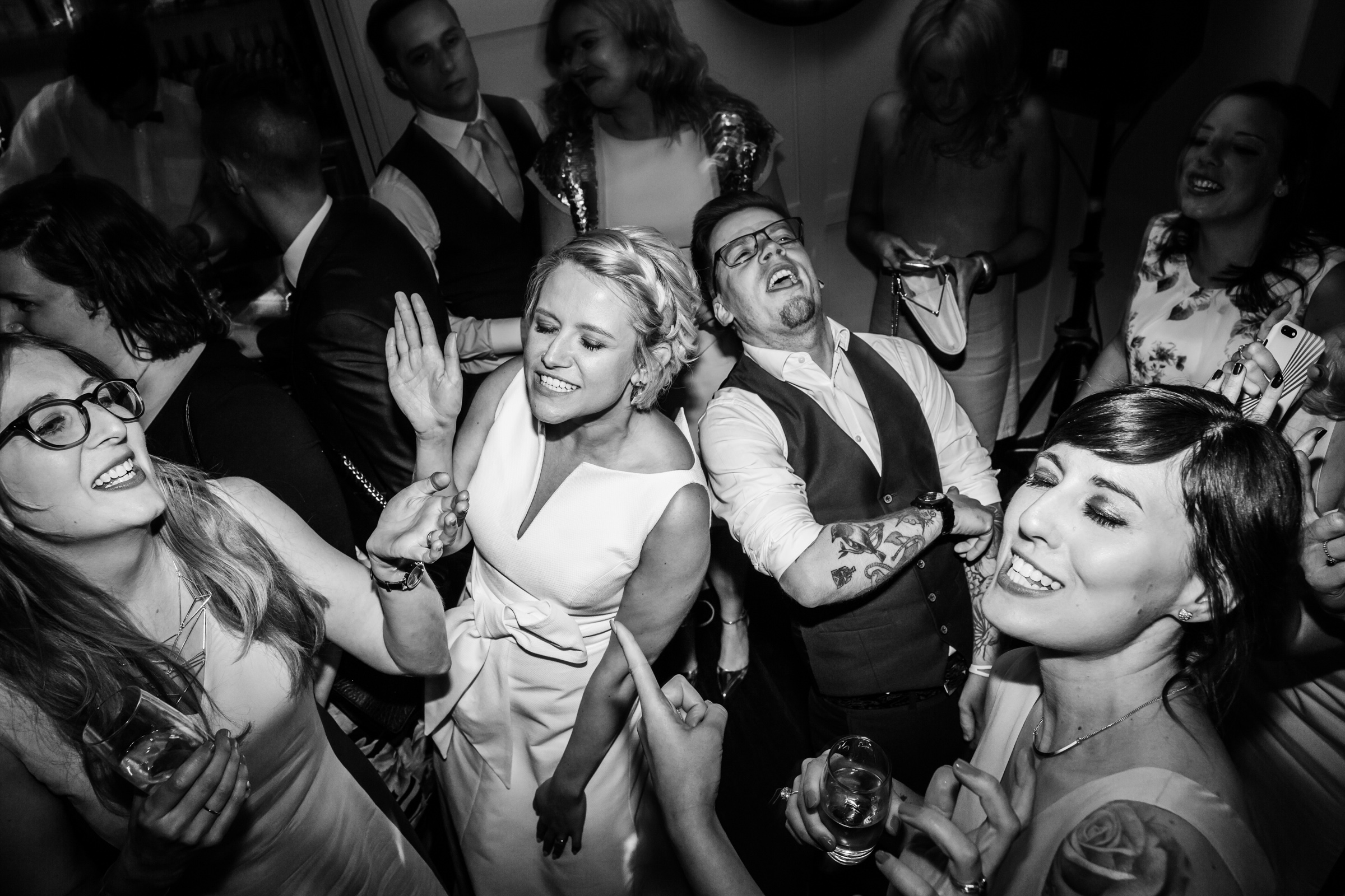 a packed dance floor during a wedding at great john street hotel manchester