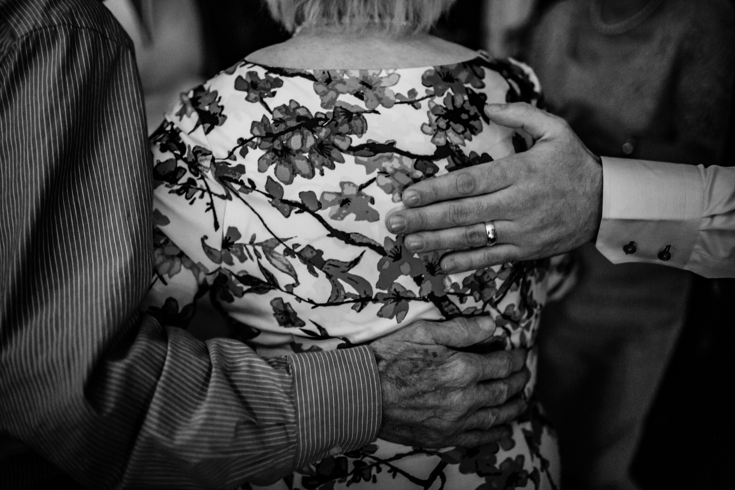 hugs at a wedding atgreat john street hotel manchester