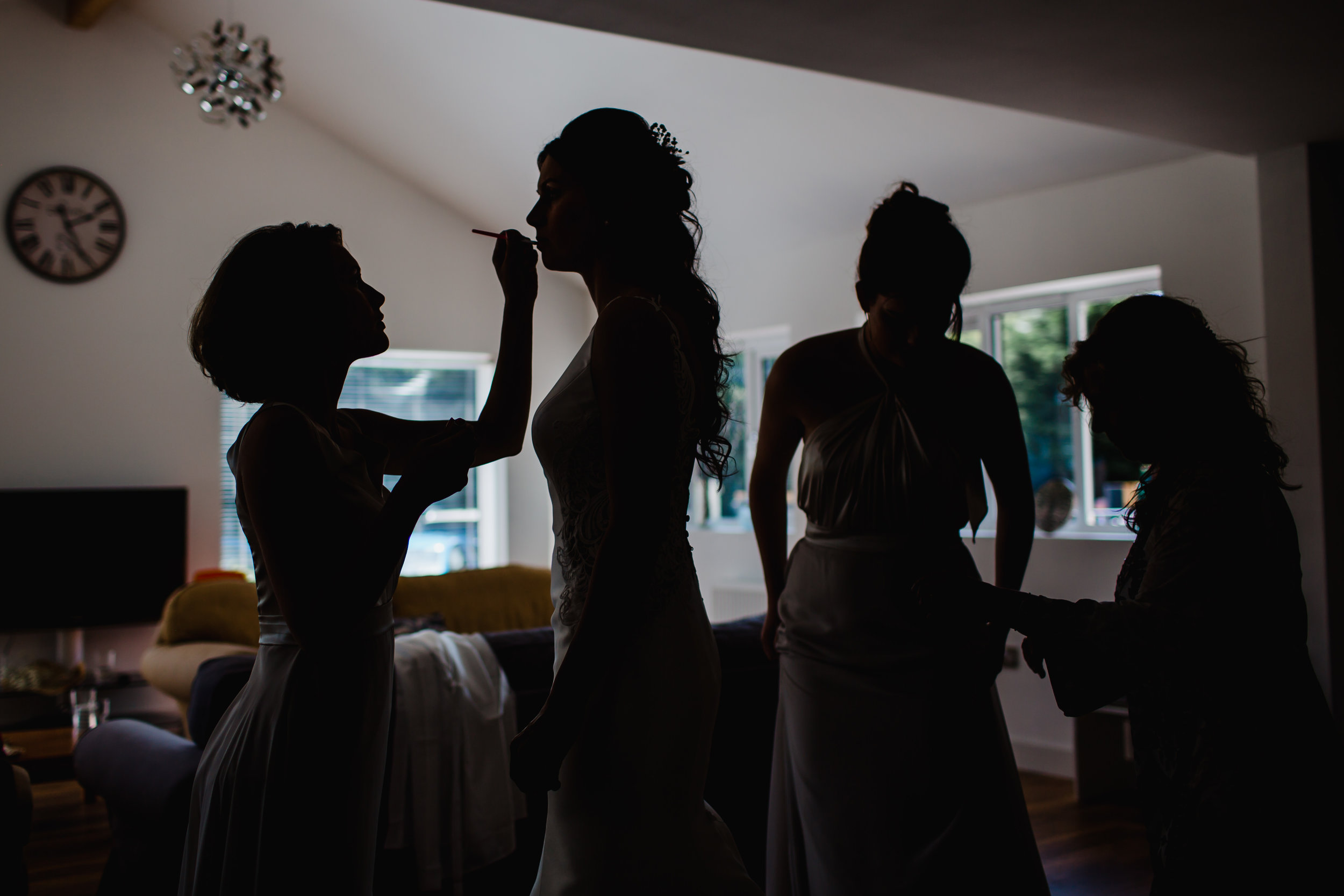 A bride finishes her make up before her wedding in the West Midlands.