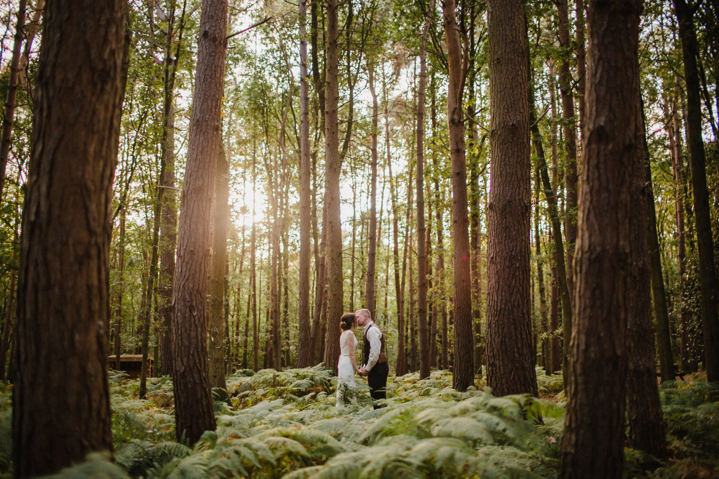 a bride and groom portrait shot in the forest at enchanted woodland weddings birmigham