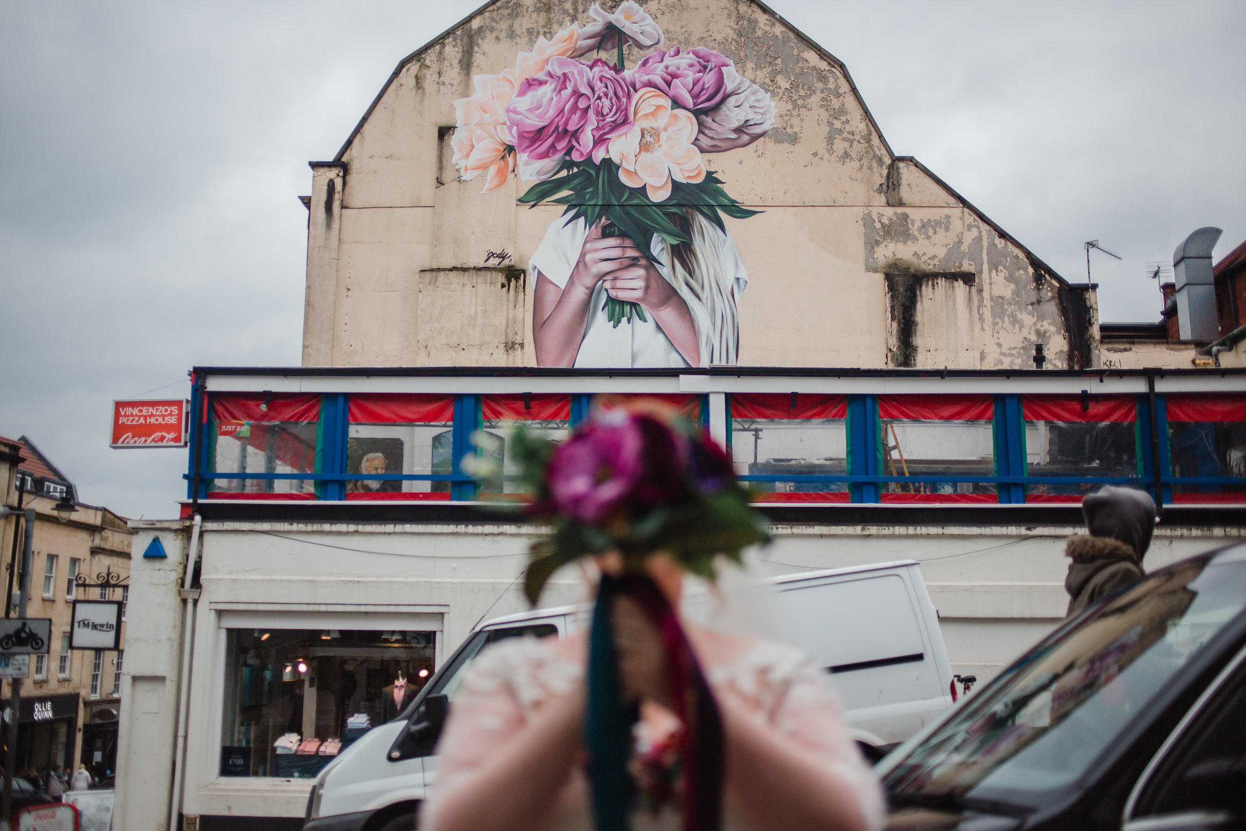 two brides and flowers - street art in bristol