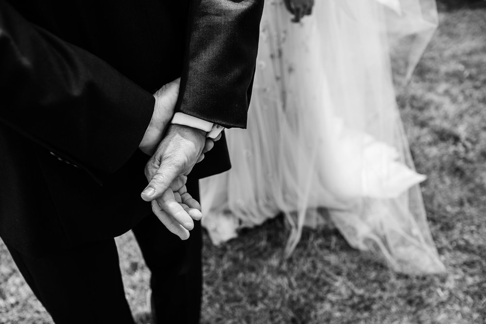 a bride and her father before the wedding