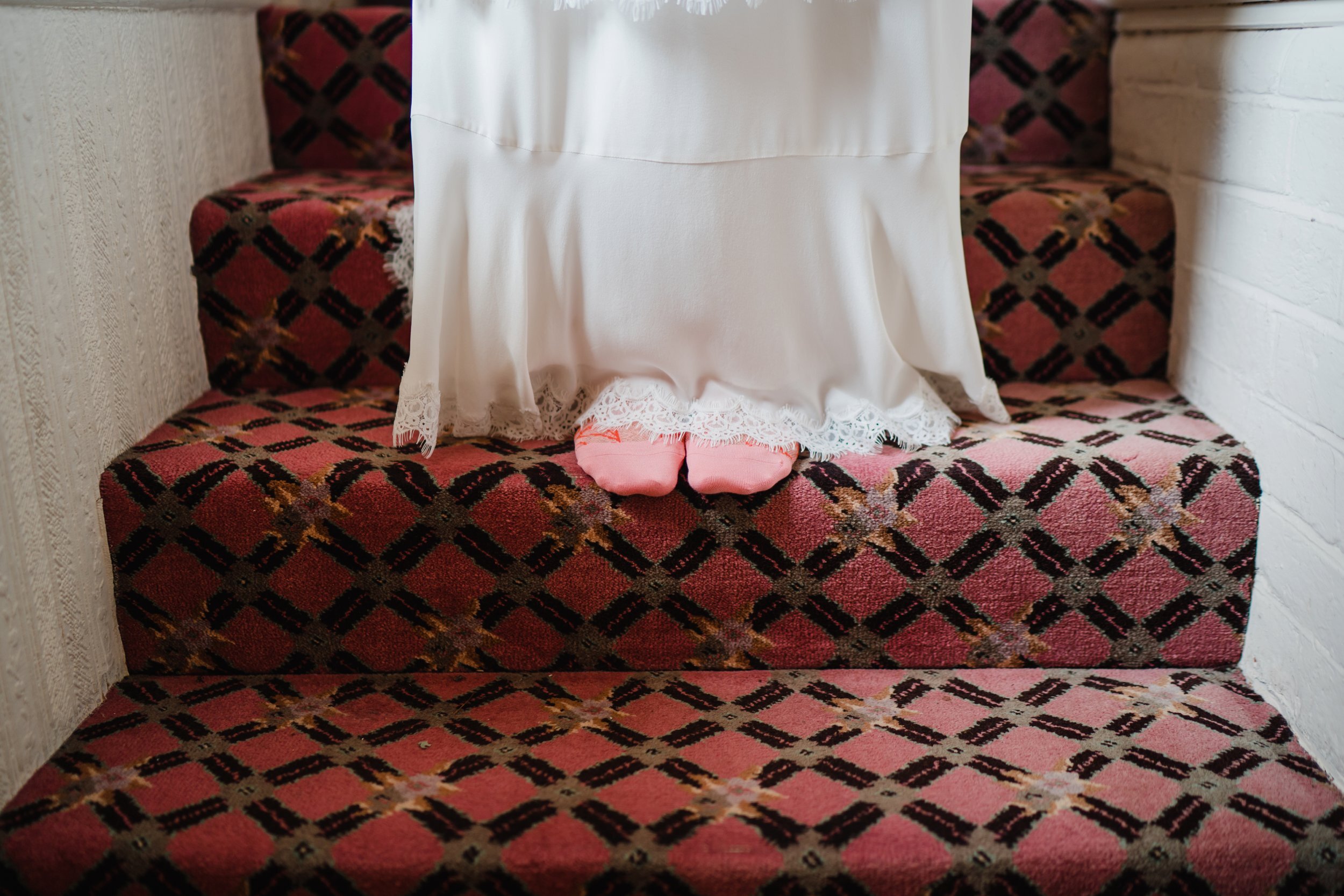 A brides feet on her wedding day