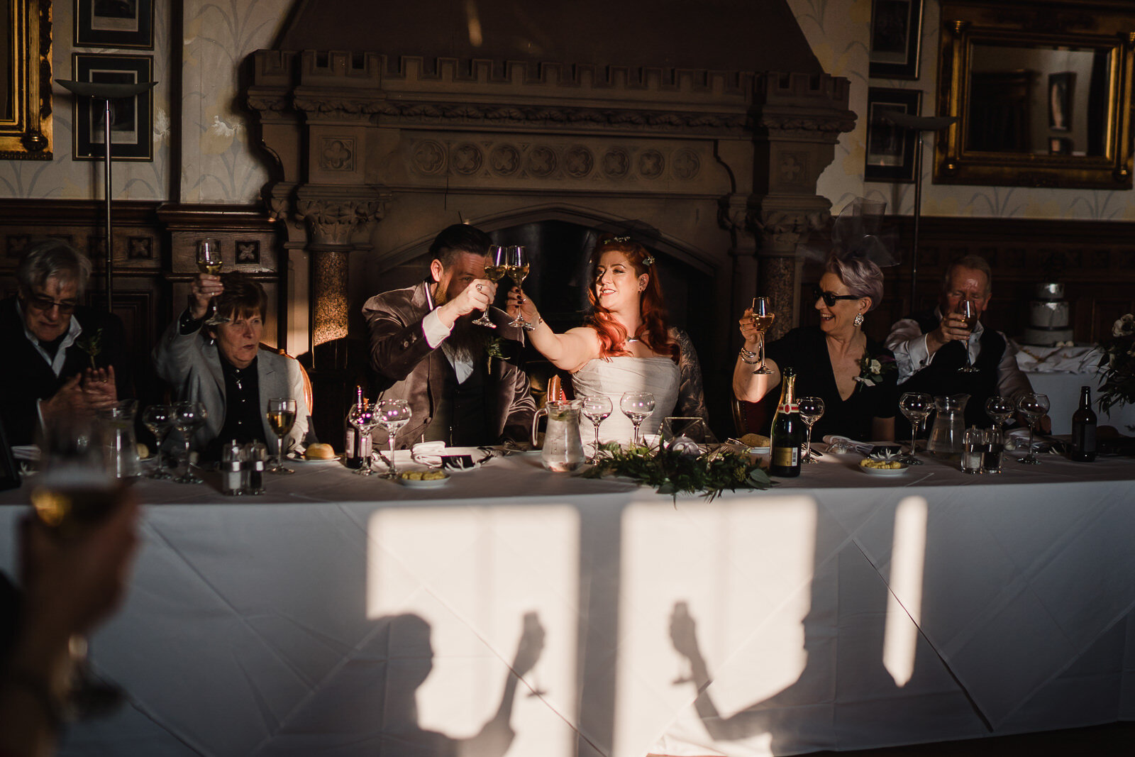 a toast to the bride and groom at Wroxhall Abbey