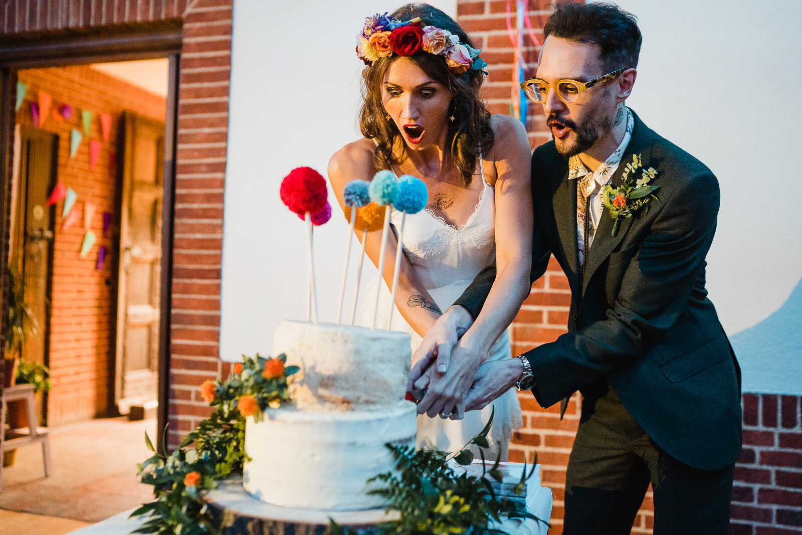 bride and groom cut the cake and its goes wrong in Hook