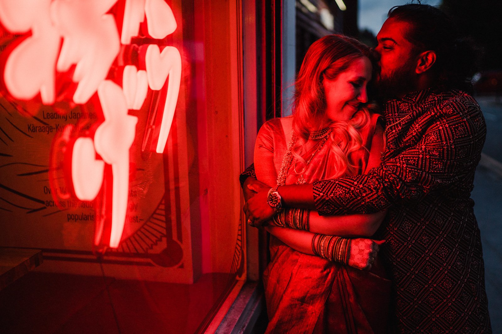 red neon couples portrait - 2022 wedding round up no nonsense heartfelt wedding photography leeallenphotos