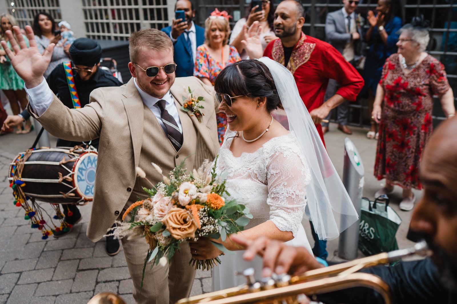 bride and groom dance with a band at the Custard factory digbeth - 2022 wedding round up no nonsense heartfelt wedding photography leeallenphotos