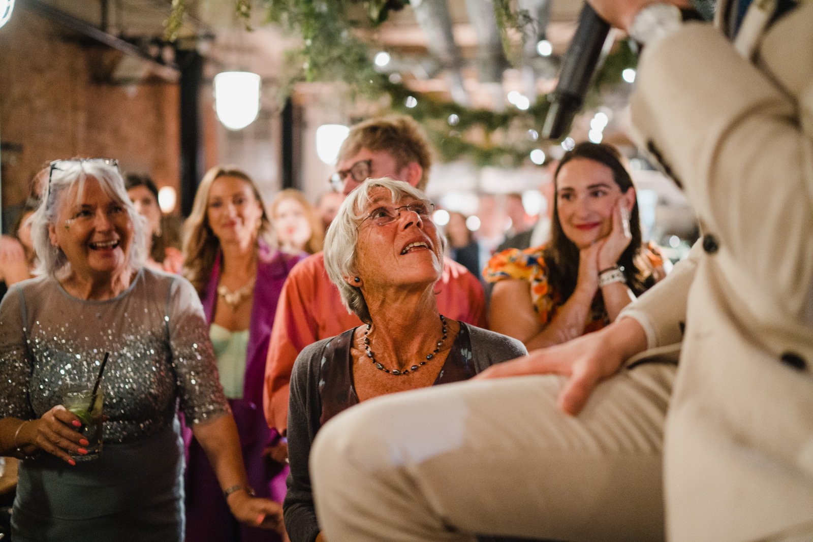 a mother looks up at her son during the speeches at a wedding at Jones and sons london  - 2022 wedding round up no nonsense heartfelt wedding photography leeallenphotos