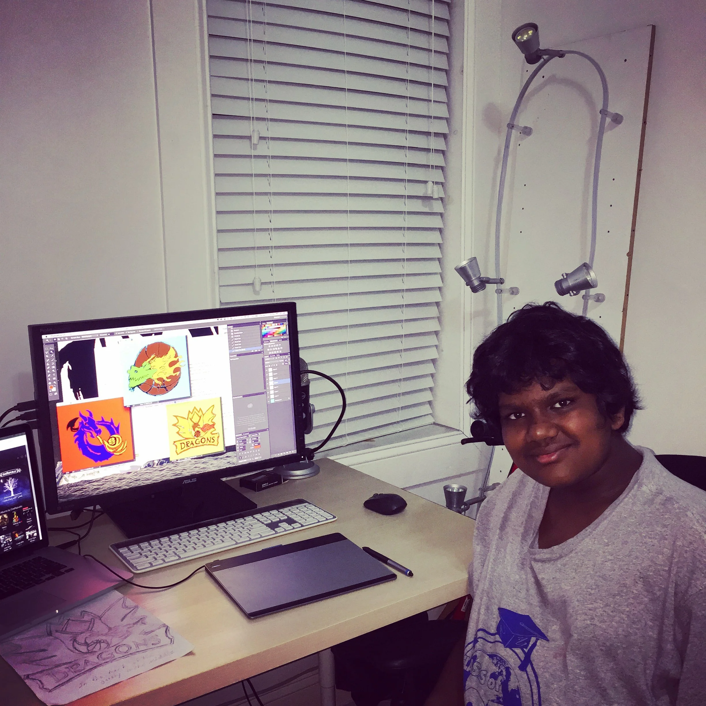 A creative Dragon helping to shape the design of the jerseys