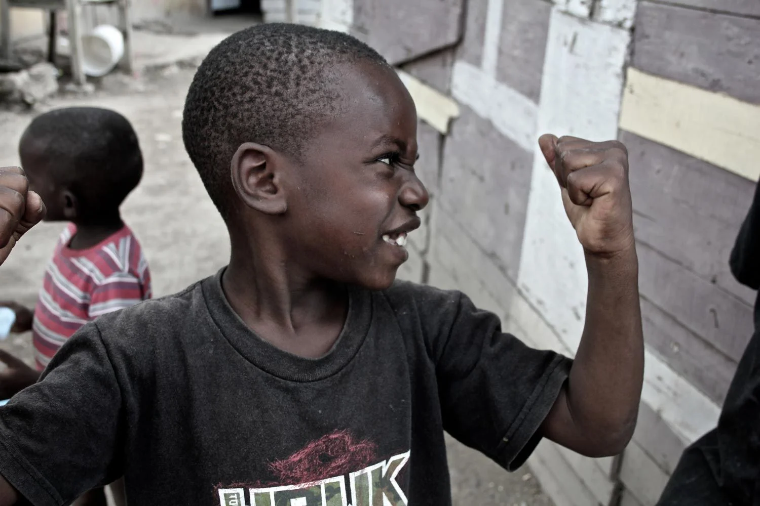 1500x1000-Haitian-Refugee-Boy-Muscles.jpg
