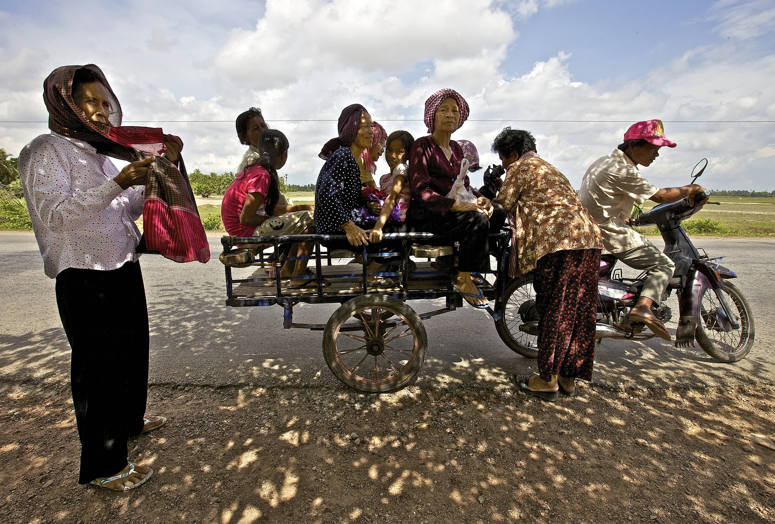 catching a bit of shade on the daily commute, southern cambodia