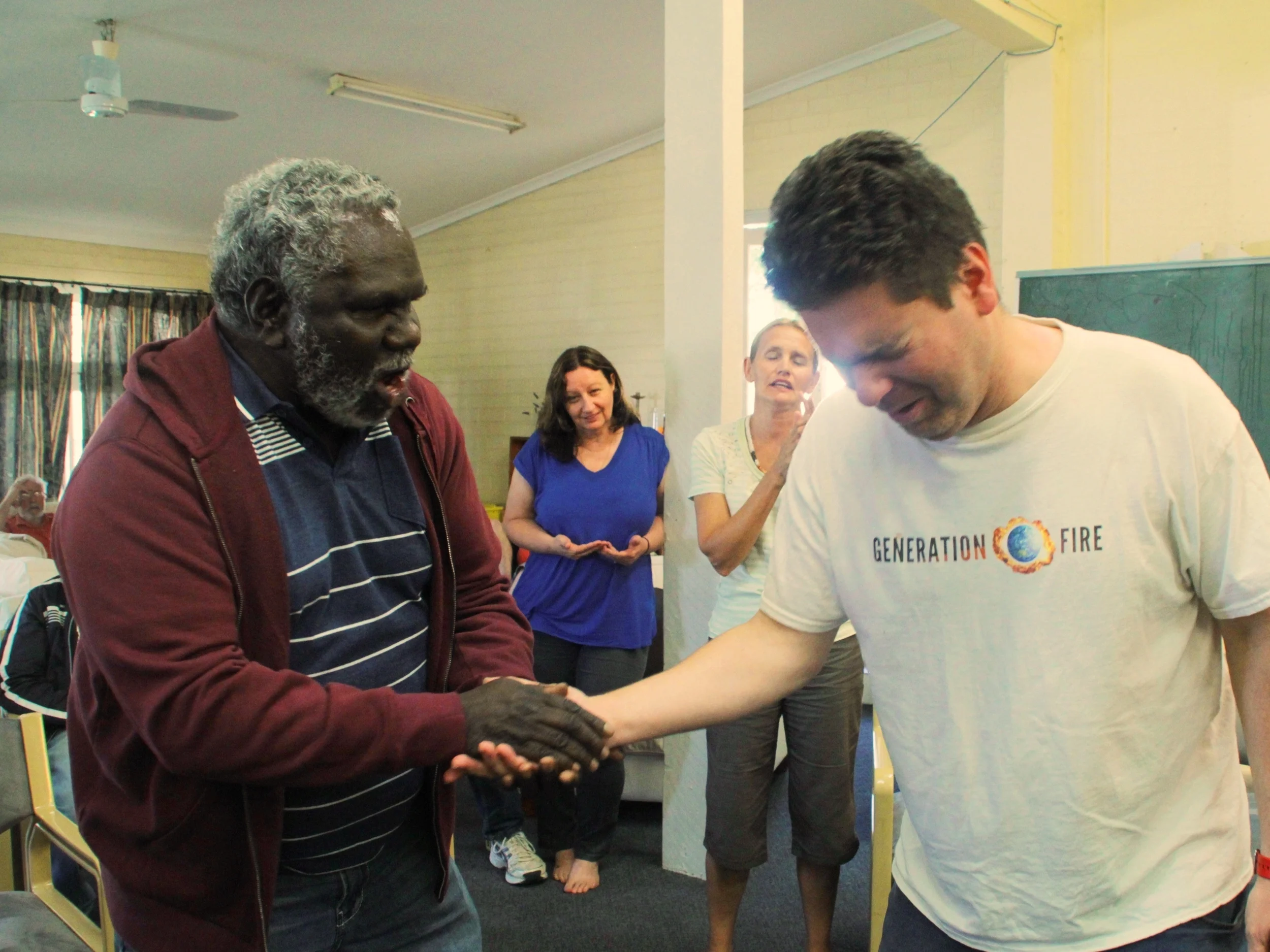 Alan Maratja &amp; Donny McGregor pray for each other whilst holding a Coal from Wales which prophetically was speaking about receiving the Blessings of the Welsh Revival. A piece of this Coal will go to Elcho Island in September 2016