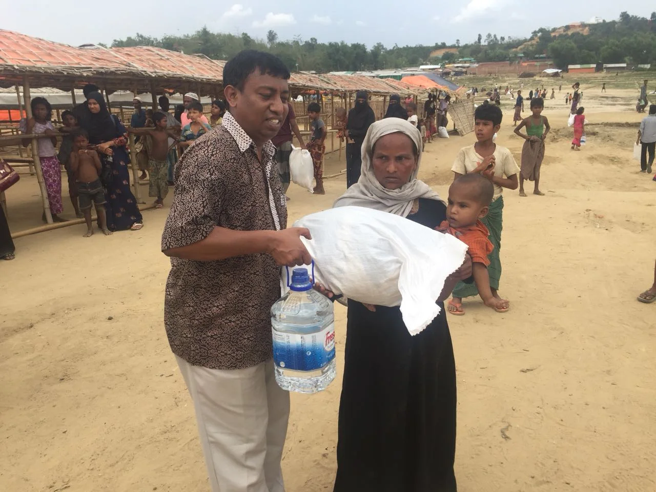 Genfire Bangladesh Team ministering with the Rohinga People