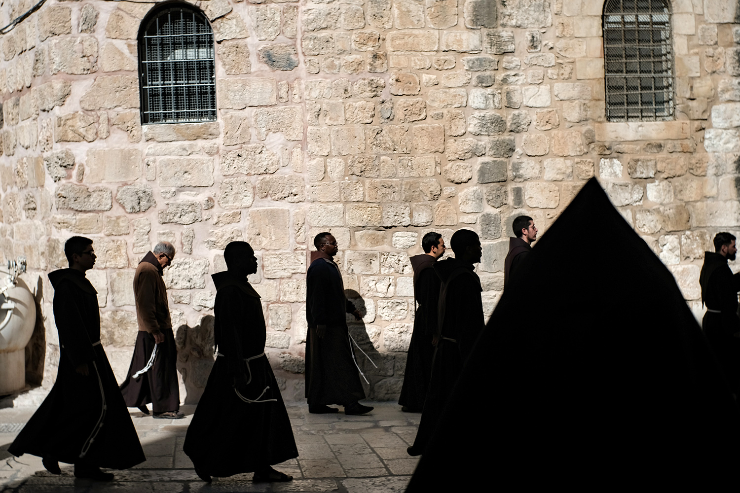  Priests arrive for Mass at the Church of the Holy Sepulchre in Jerusalem. 