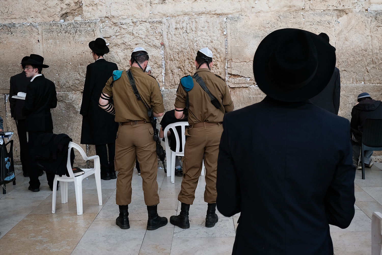  Israeli soldiers join others in prayer at the Western Wall in Jerusalem. 