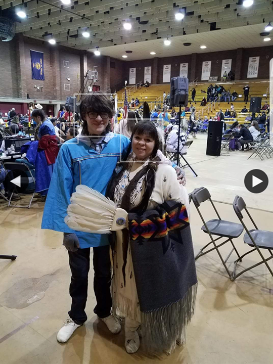 BOY and MOM - in powwow regalia.png