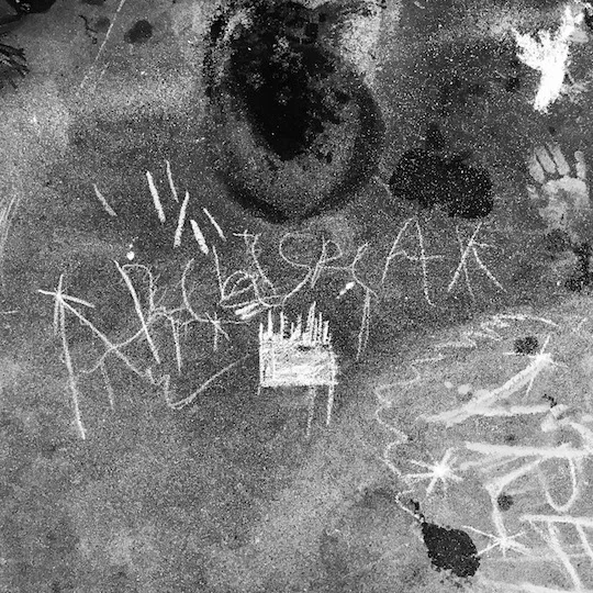 Chalk art Archispeak logo by Evan's kids