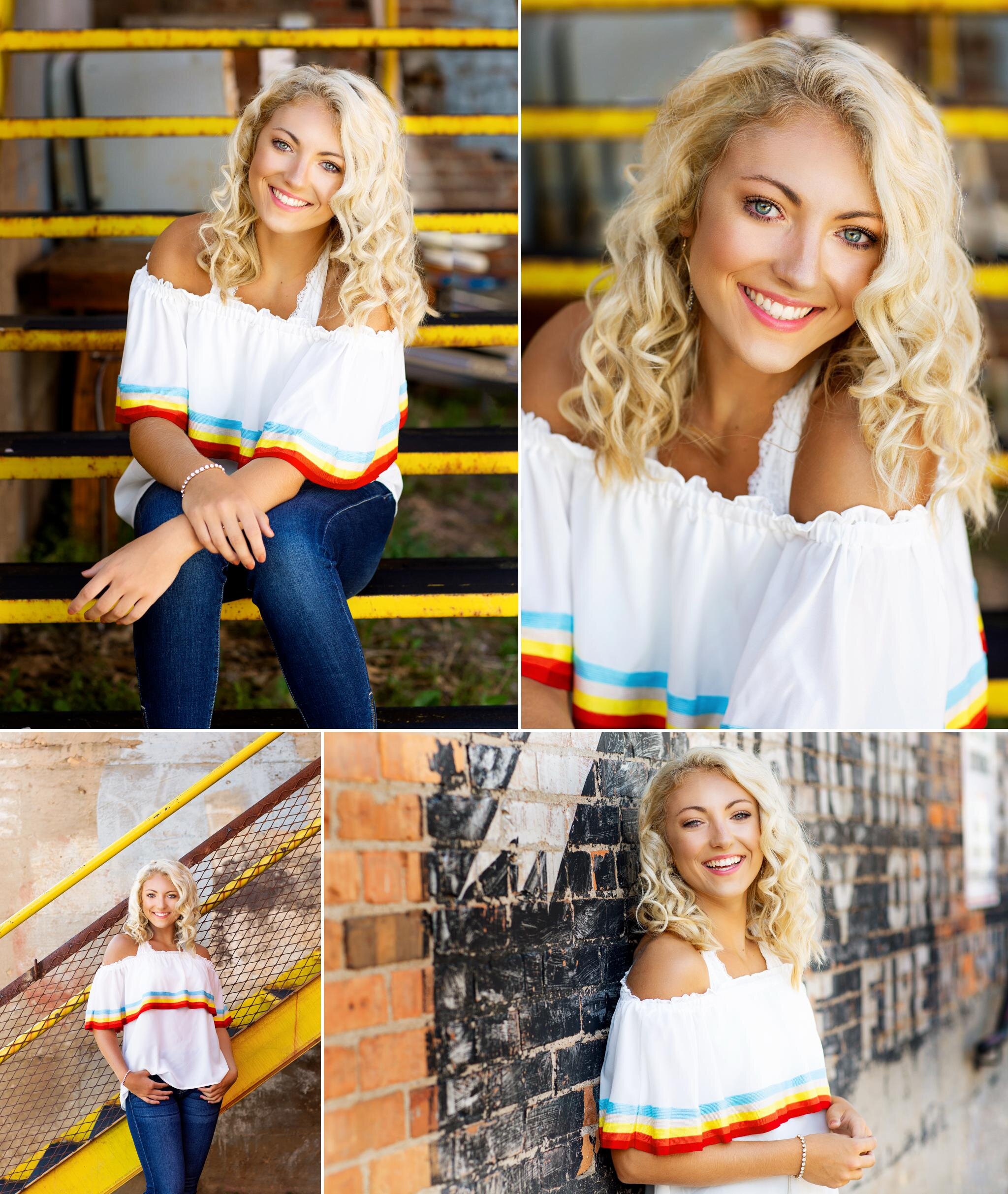 blonde senior girl in a white off the shoulder top with dark denim jeans sitting on a yellow set of metal stairs