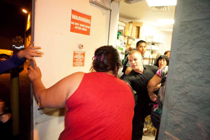  Pedestrians rush for safety into the back room of a Starbucks after violence erupted between police officers and protesters.    