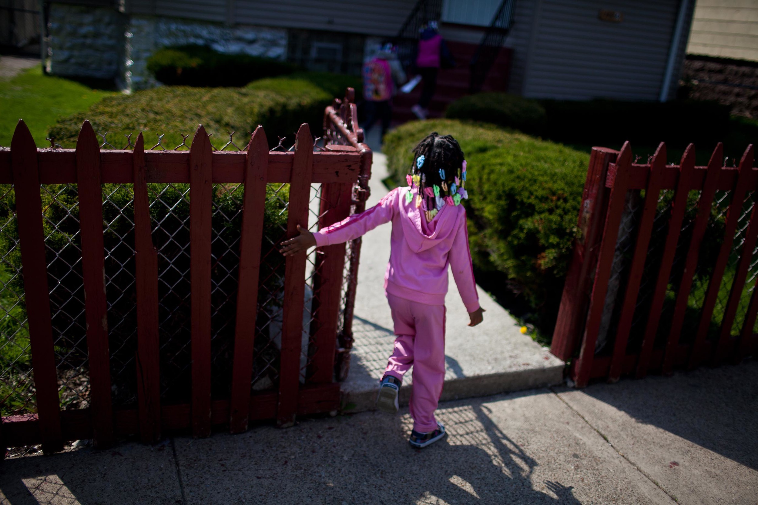   Destiny Johnson’s three daughters enter the family’s home in Auburn Gresham, one of the 10 communities in Chicago with the highest number of youth homicides. Between 2008 and 2012, 41 people younger than 25 were killed in the neighborhood.   