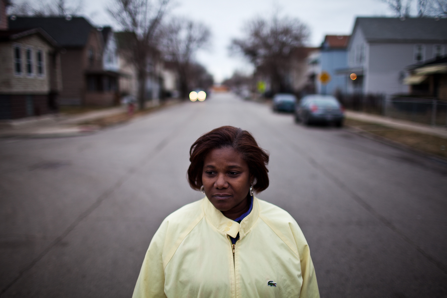  Gwendolyn Moore, the mother of an unarmed man shot and killed by Chicago police officers after a neighborhood car chase, poses for a photo outside her Englewood home, wearing a jacket that belonged to her slain son, Jamaal. 