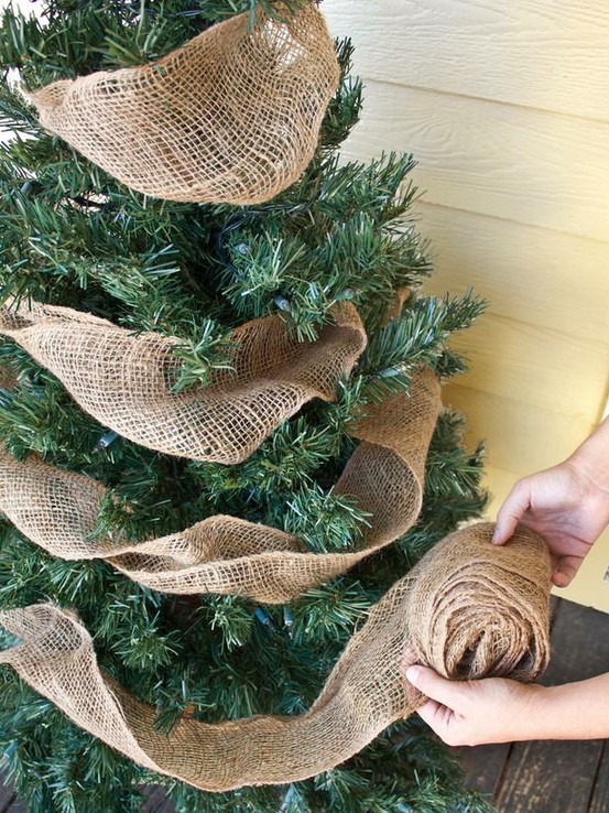 Article + Gallery ➤ http://CARLAASTON.com/designed/decorating-with-burlap For The Love Of Burlap | The Holiday's Hottest Decorating Tool (Image Source: HGTV - KWs: decor, tutorial, DIY, Christmas, tree)