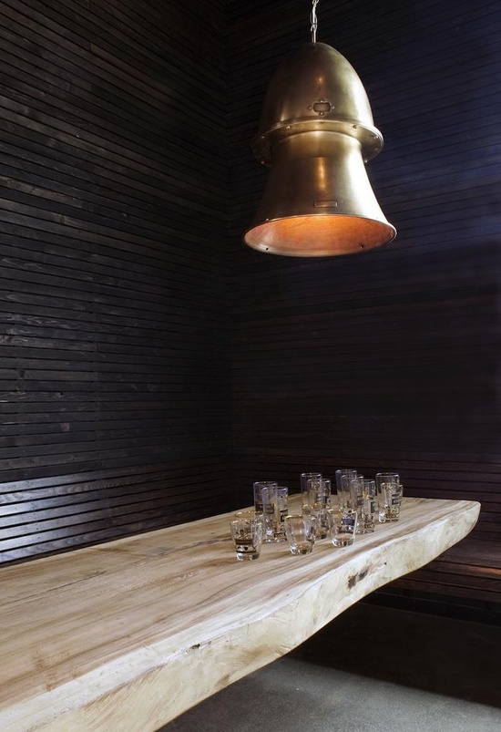 Black walls, a live edge, and brass? What more is there to love.
