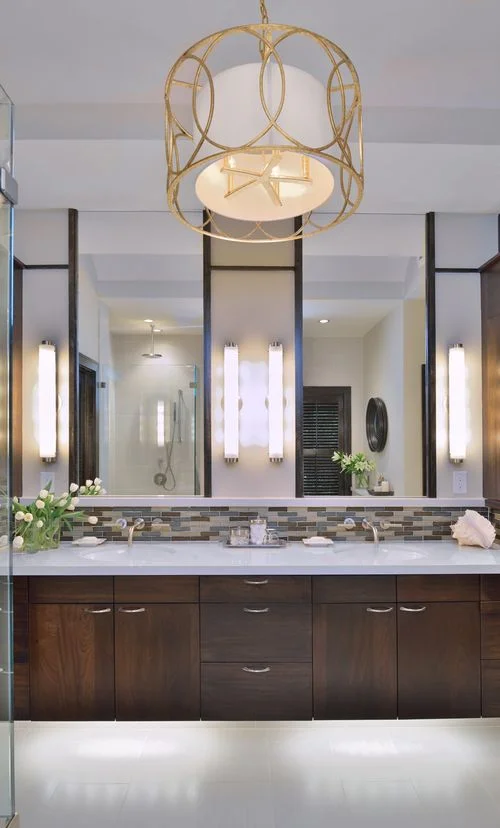 Bathroom design trends |Contemporary bathroom remodel before and after with tall mirrors, and floating vanity | Designer: Carla Aston, Photographer: Miro Dvorscak #bathroom #bathroomideas #bathroomremodel
