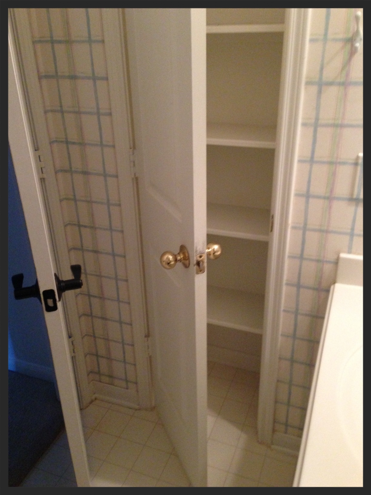 Upstairs Bath Before - Small linen closet behind the door.JPG