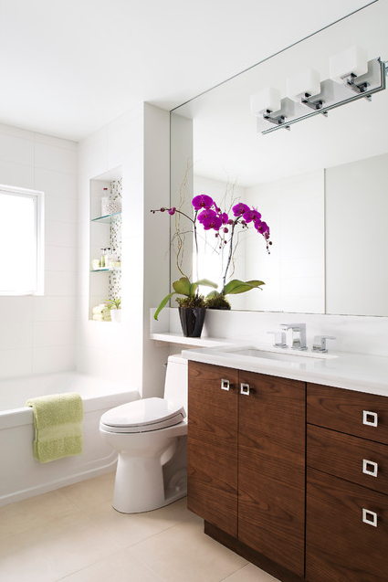Personally, I love an exceptionally tall mirror in a space, because it adds height and feels luxurious. I love a horizontal mirror too, especially when we are trying to achieve a zen or modern look in a bathroom. | Design -er: Hicks Fine Homes