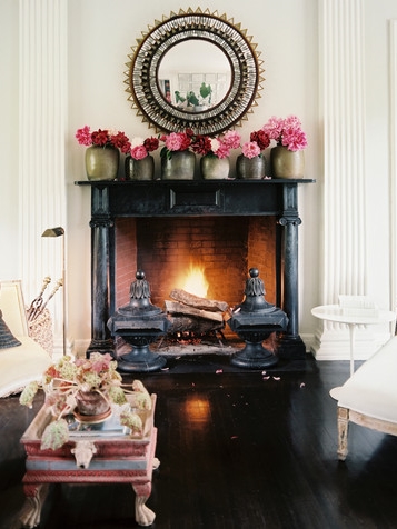 Decorate your mantel using the repetition of an decorative object. | Interior Designer: John Dransfield & Geoffrey Ross