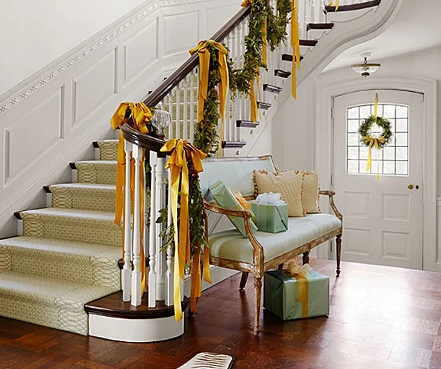 Unique garland for staircases Step Into The Christmas Spirit With A Garland Draped Staircase Designed