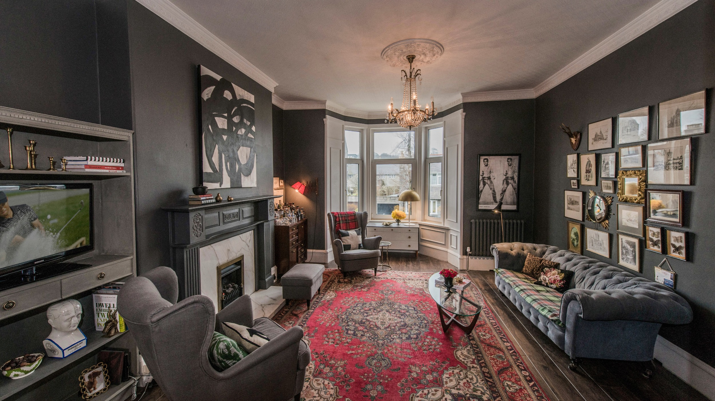 living room remodel; lighting; wall art; frame; fireplace; window; chair; mirror; rug; table | Apartment remodeled by: Deborah Peterson MIlne