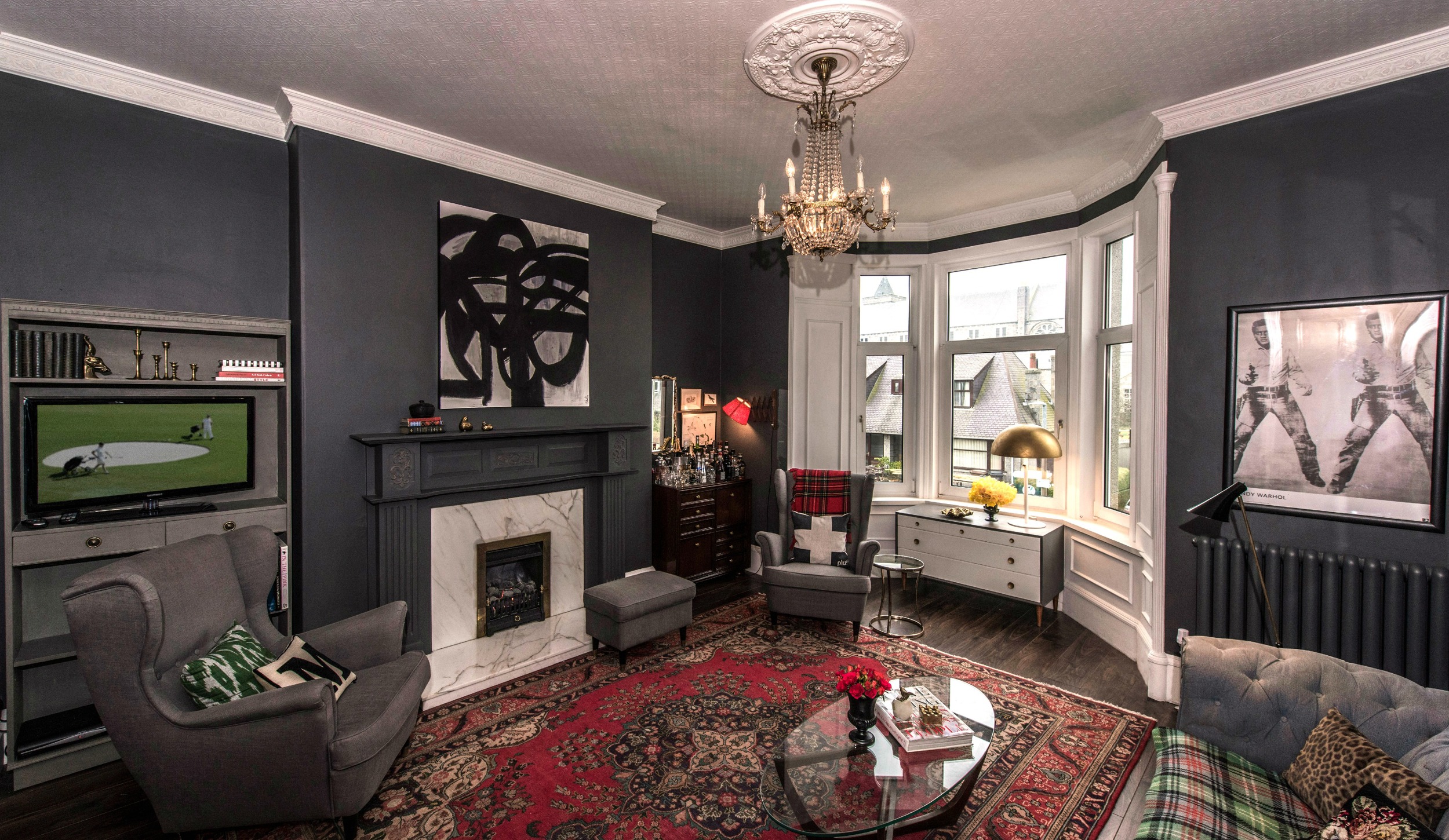 living room remodel; lighting; wall art; frame; fireplace; window; chair; mirror; rug; table | Apartment remodeled by: Deborah Peterson MIlne