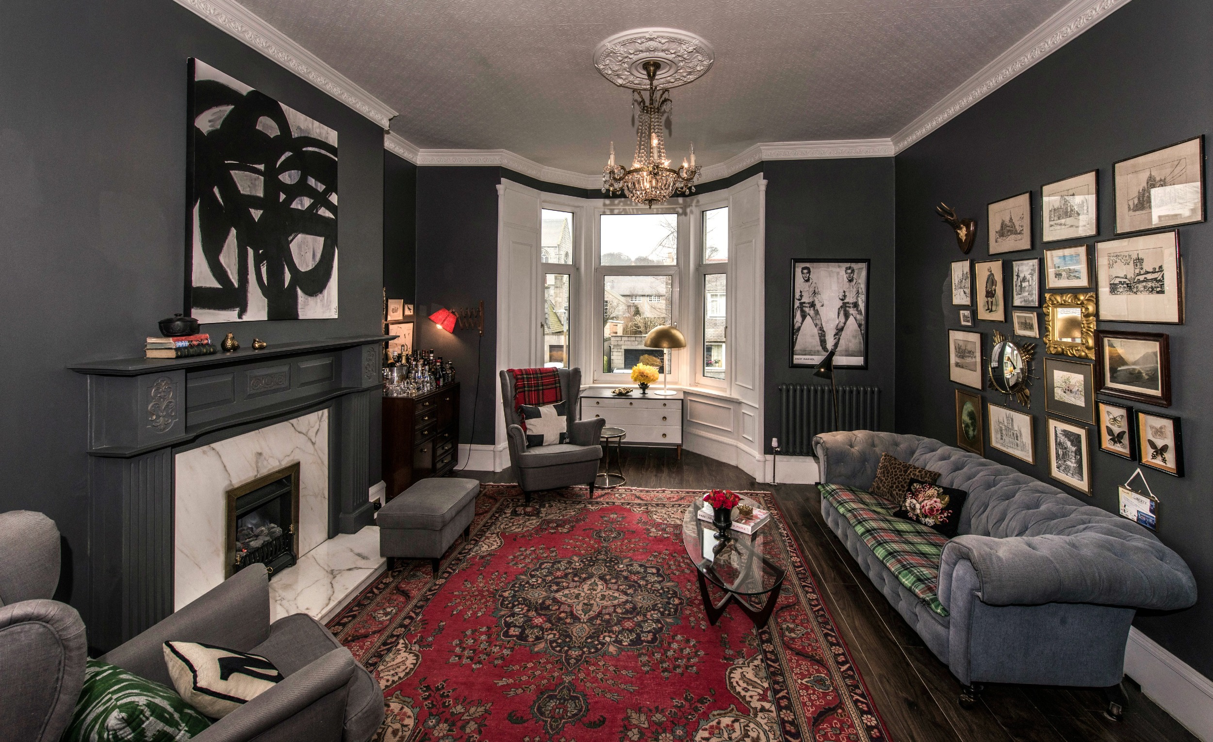 living room remodel; lighting; wall art; frame; fireplace; window; chair; mirror; rug; table | Apartment remodeled by: Deborah Peterson MIlne