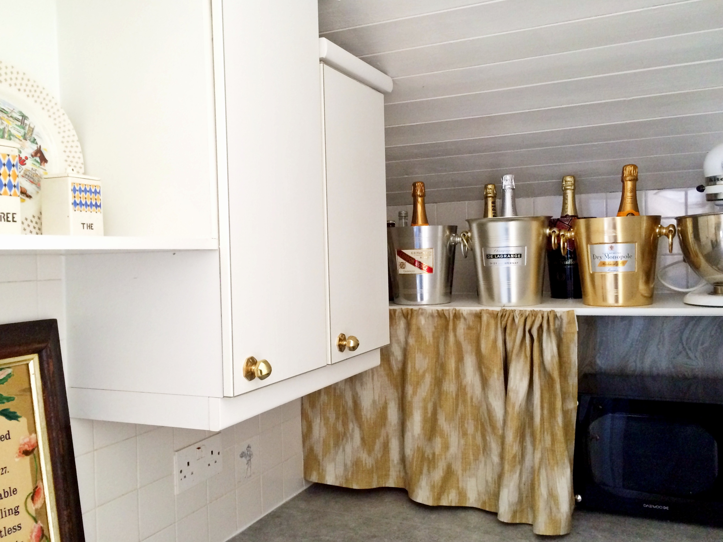 white laundry / utility room remodel; sink; cabinetry