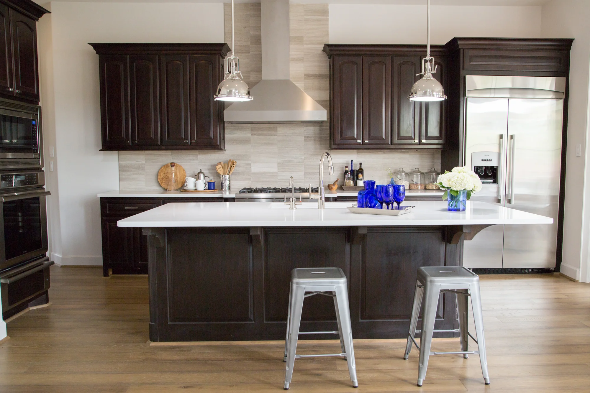  kitchen remodel; Island; stool; lighting; cabinetry; refrigerator | Interior Designer: Carla Aston / Photographer: Tori Aston