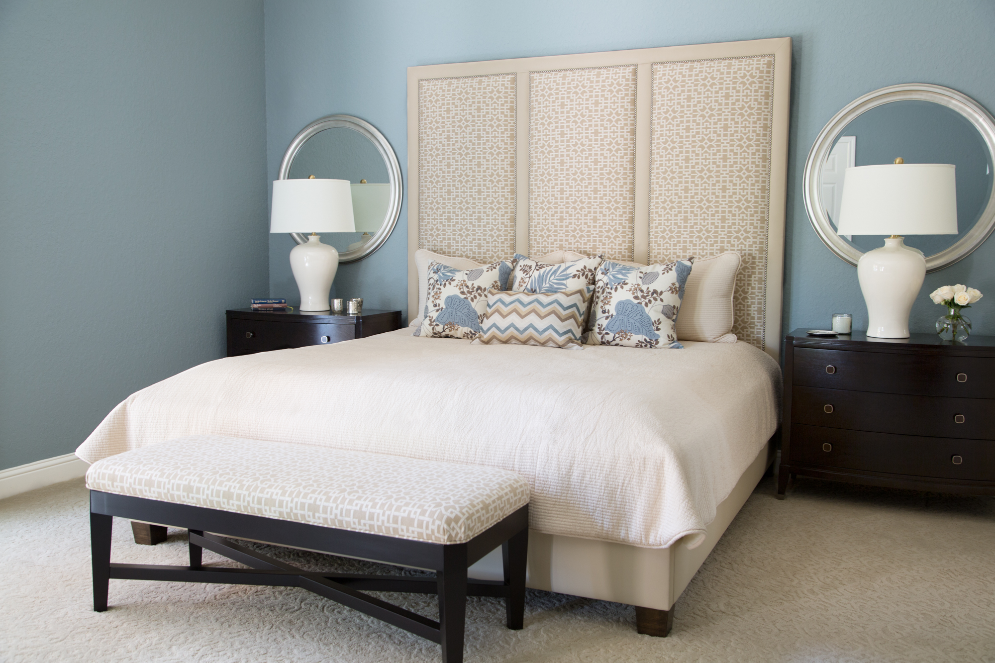 Bedroom; custom bedding; lamp; decorative pillow; headboard; mirror; etc. | Interior Designer: Carla Aston