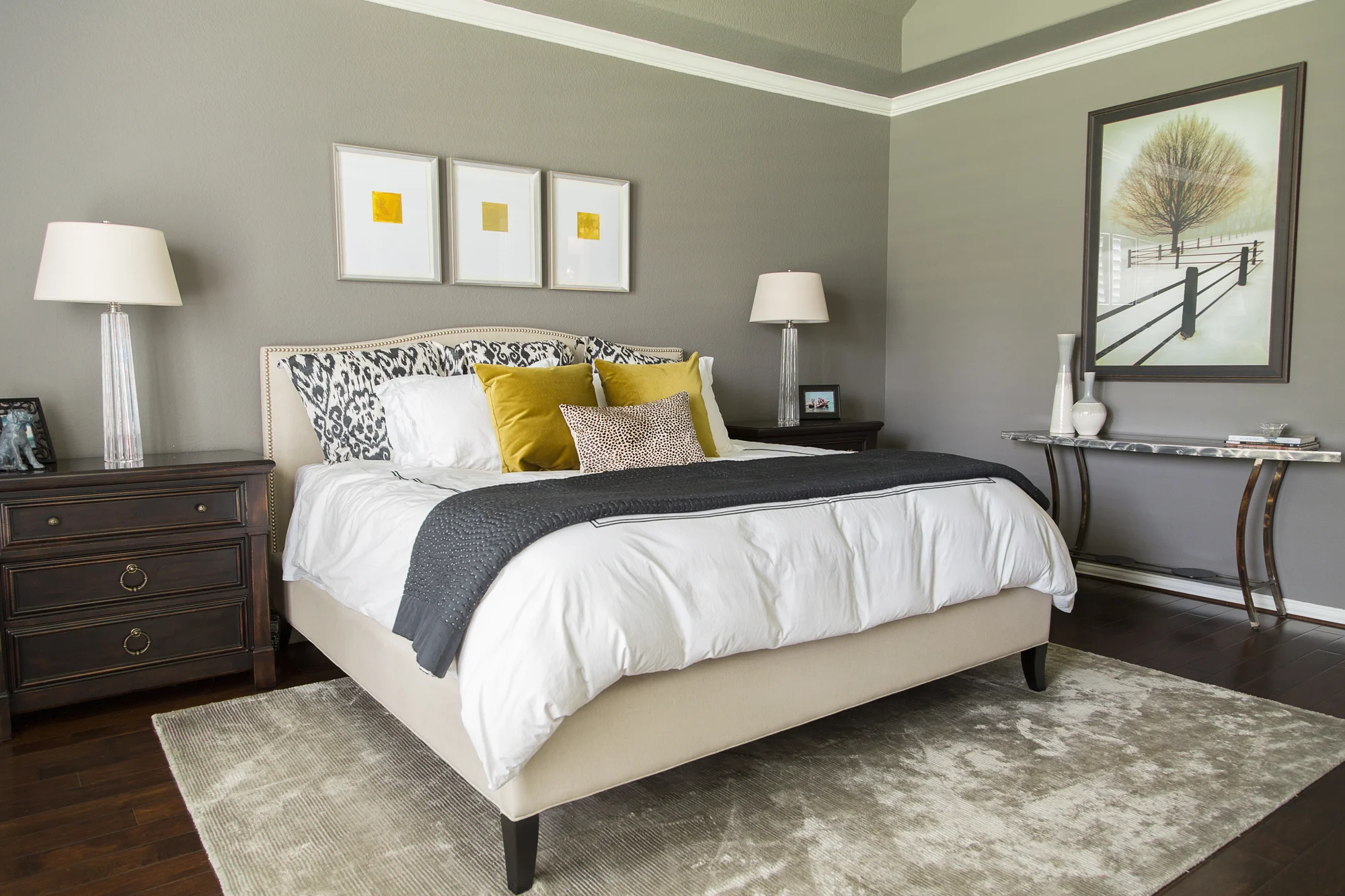 Bedroom remodel; bed; bedding; rug; lamp; lighting; mirror; table | Interior Designer: Carla Aston / Photographer: Tori Aston