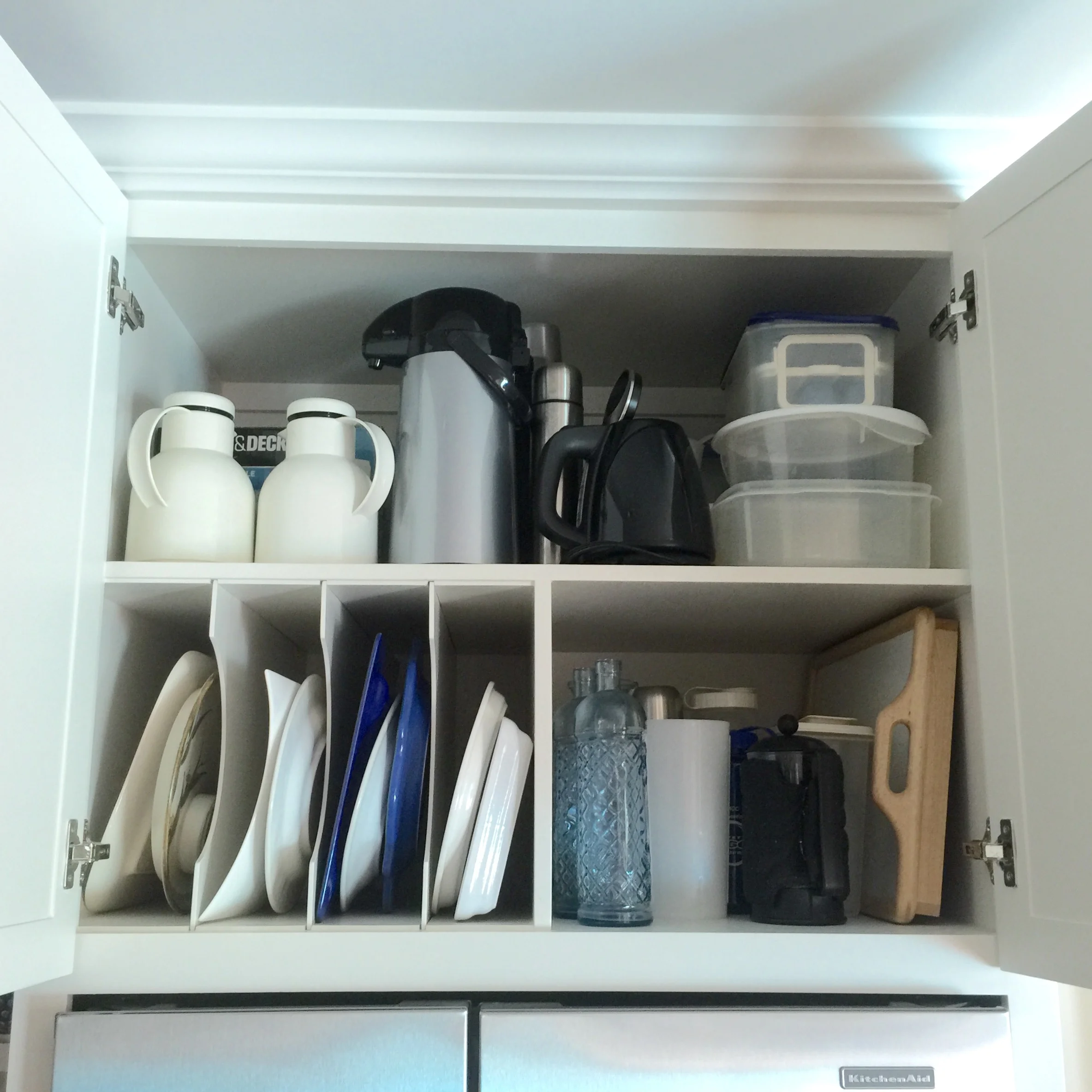 Divided storage above frig with no center stile