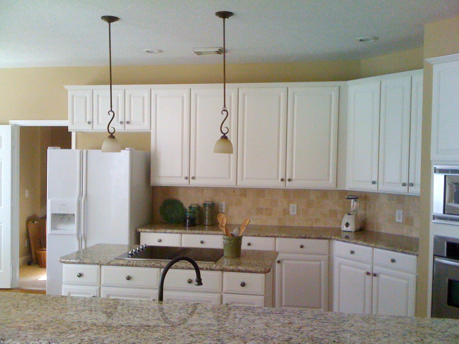Useless cabinet above frig