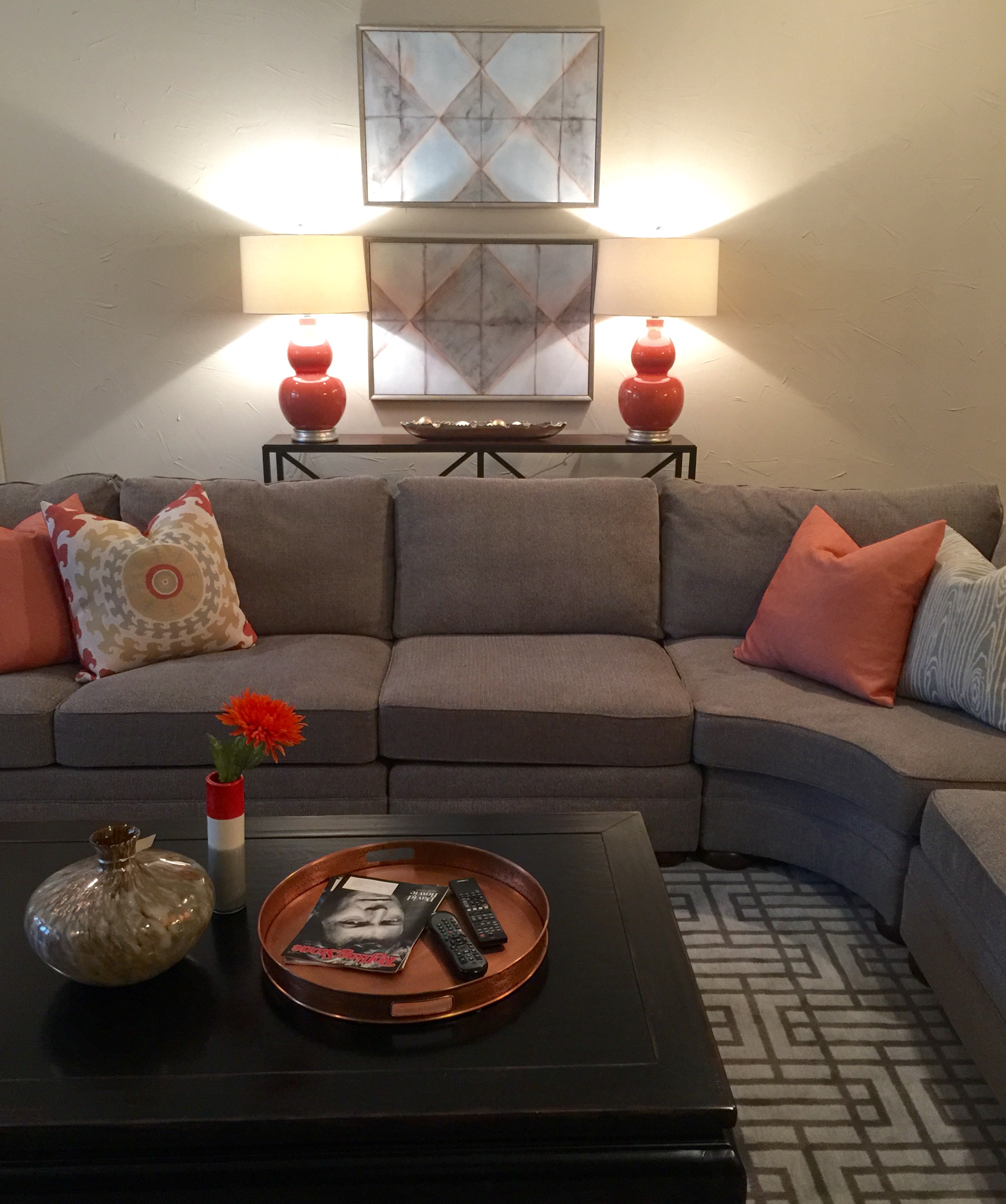 Gray Sectional With Colorful Pillows And Accents