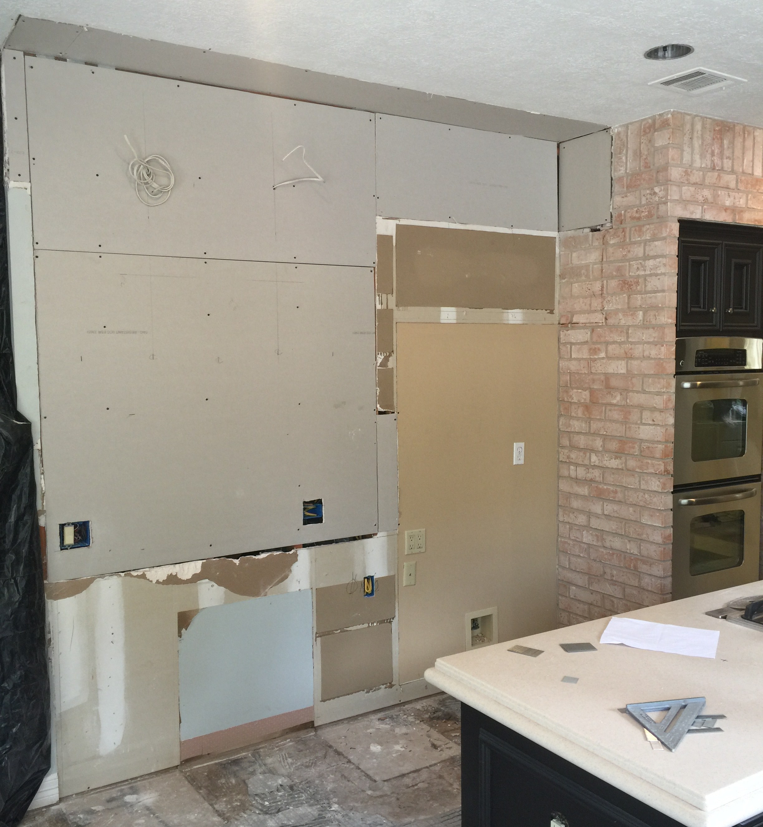 Progress Shot - New full height refrigerator cabinet to go in with new lower cabs and open shelving above