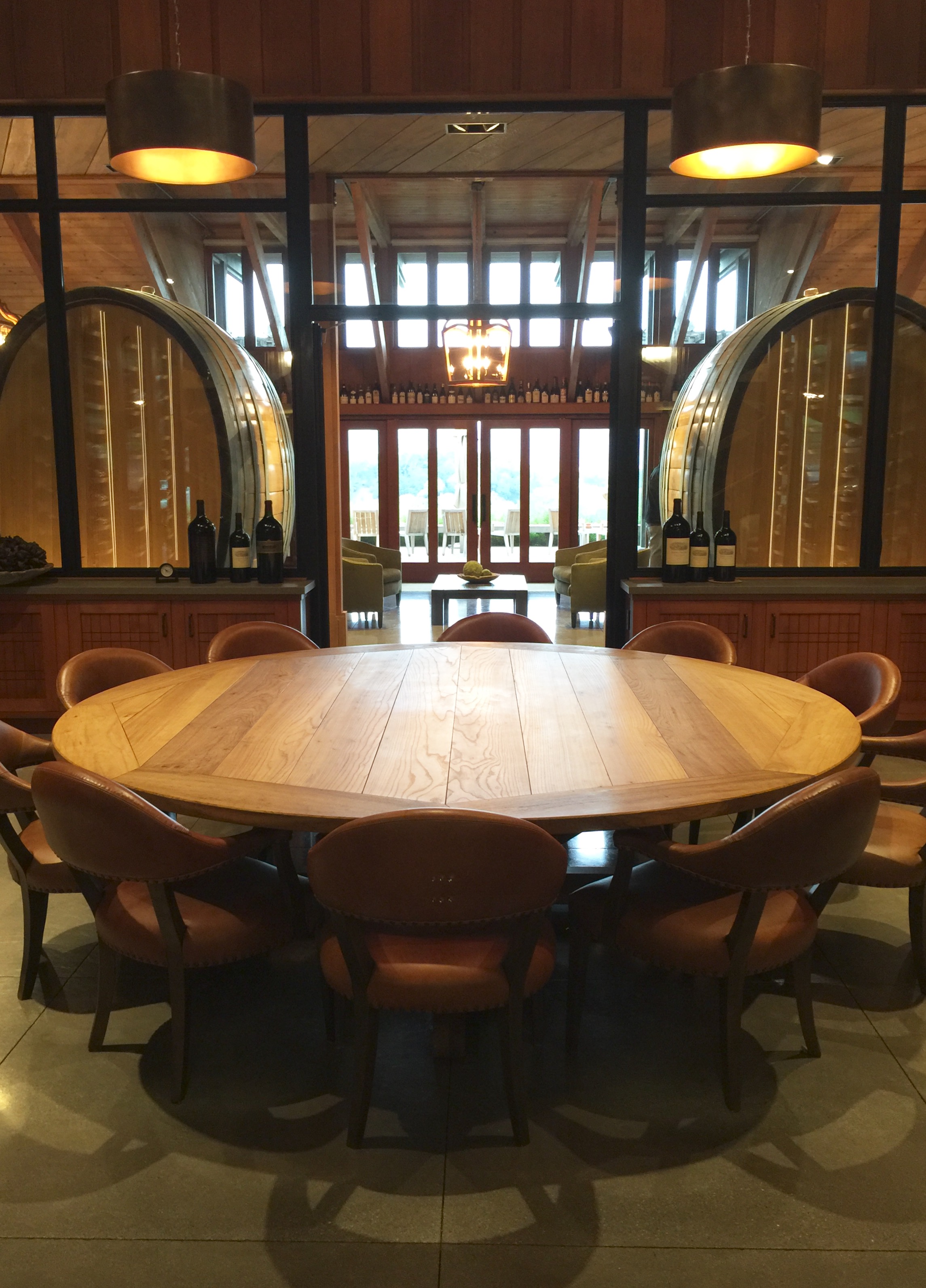 A custom made table centers in the Library, developed to tell the winery's history and display historic bottles.