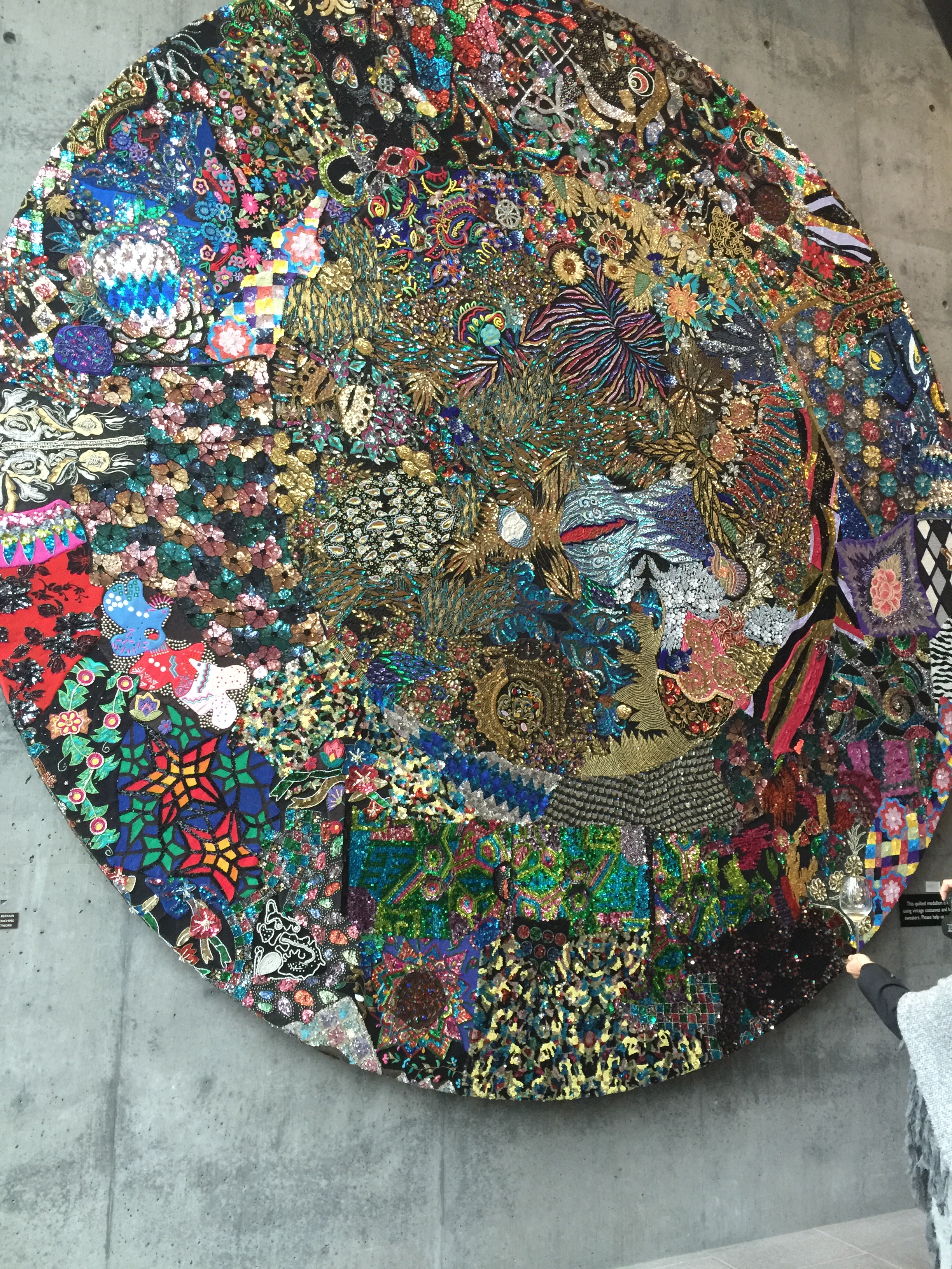 Medallion art piece in lobby at Hall Wines, by Nick Cave.