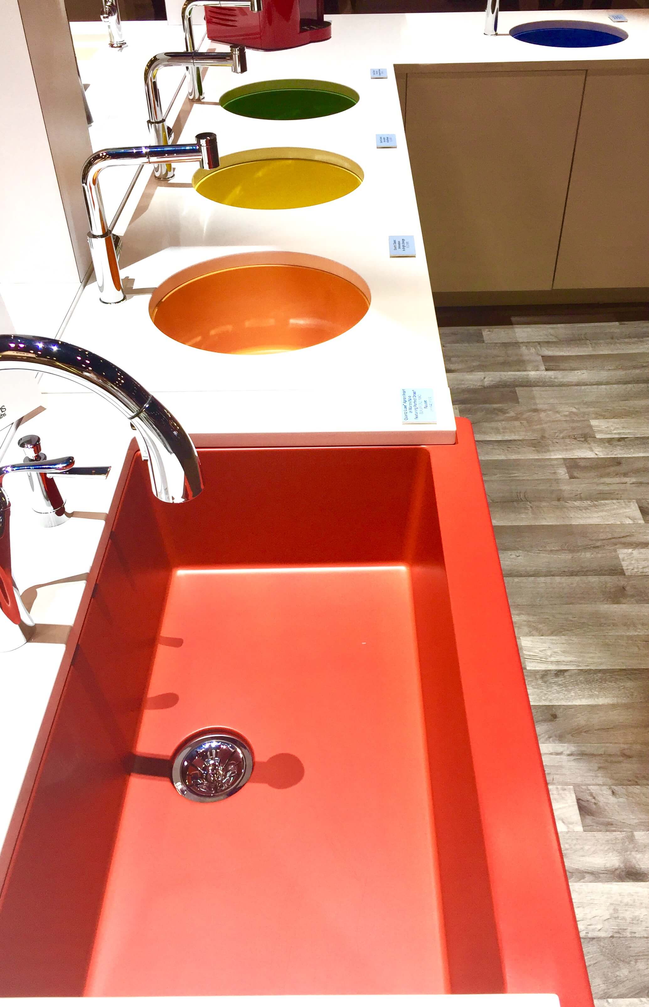 Bright colored sinks made a debut at Elkay.