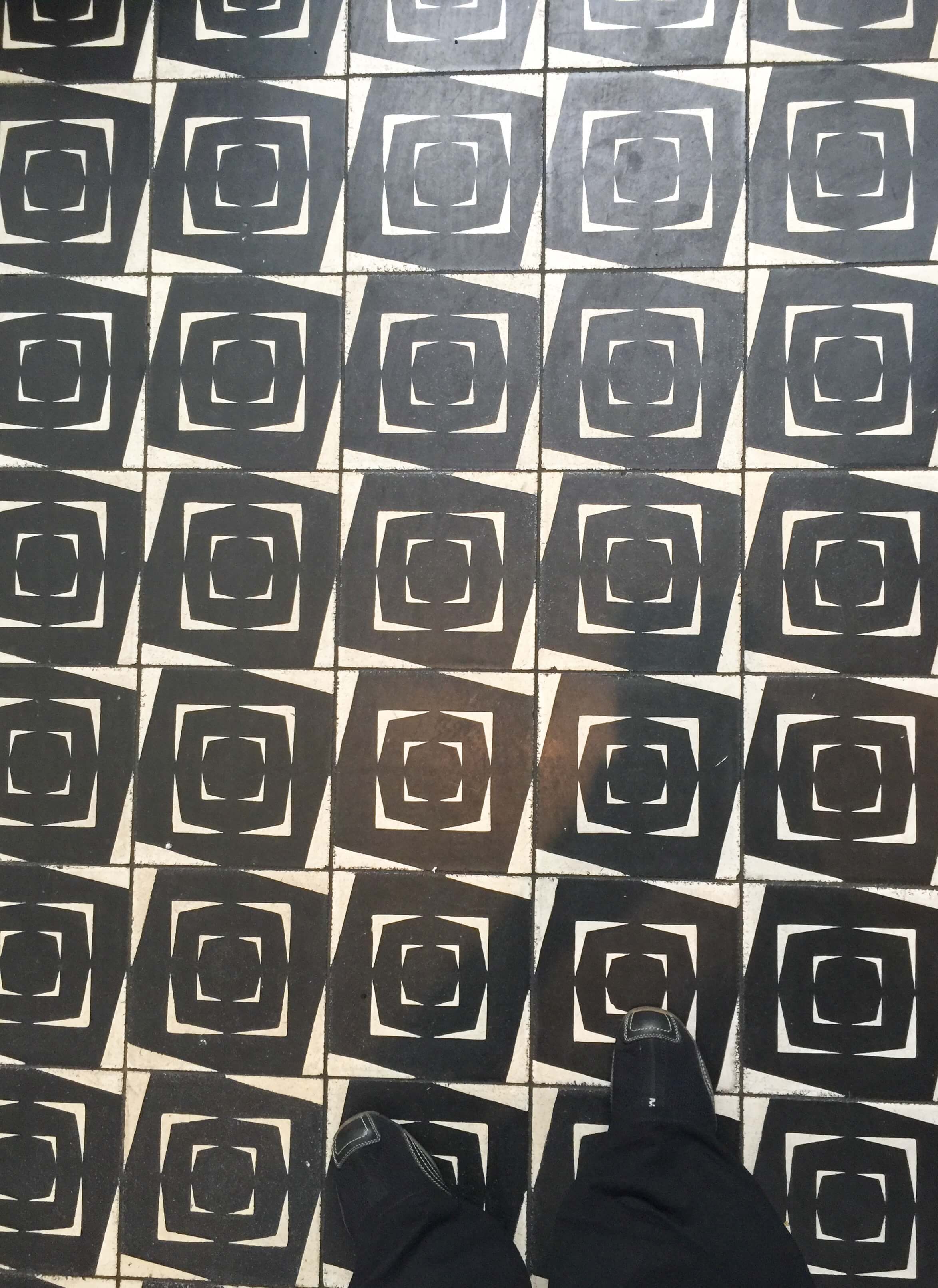 Graphic black and white tile floor