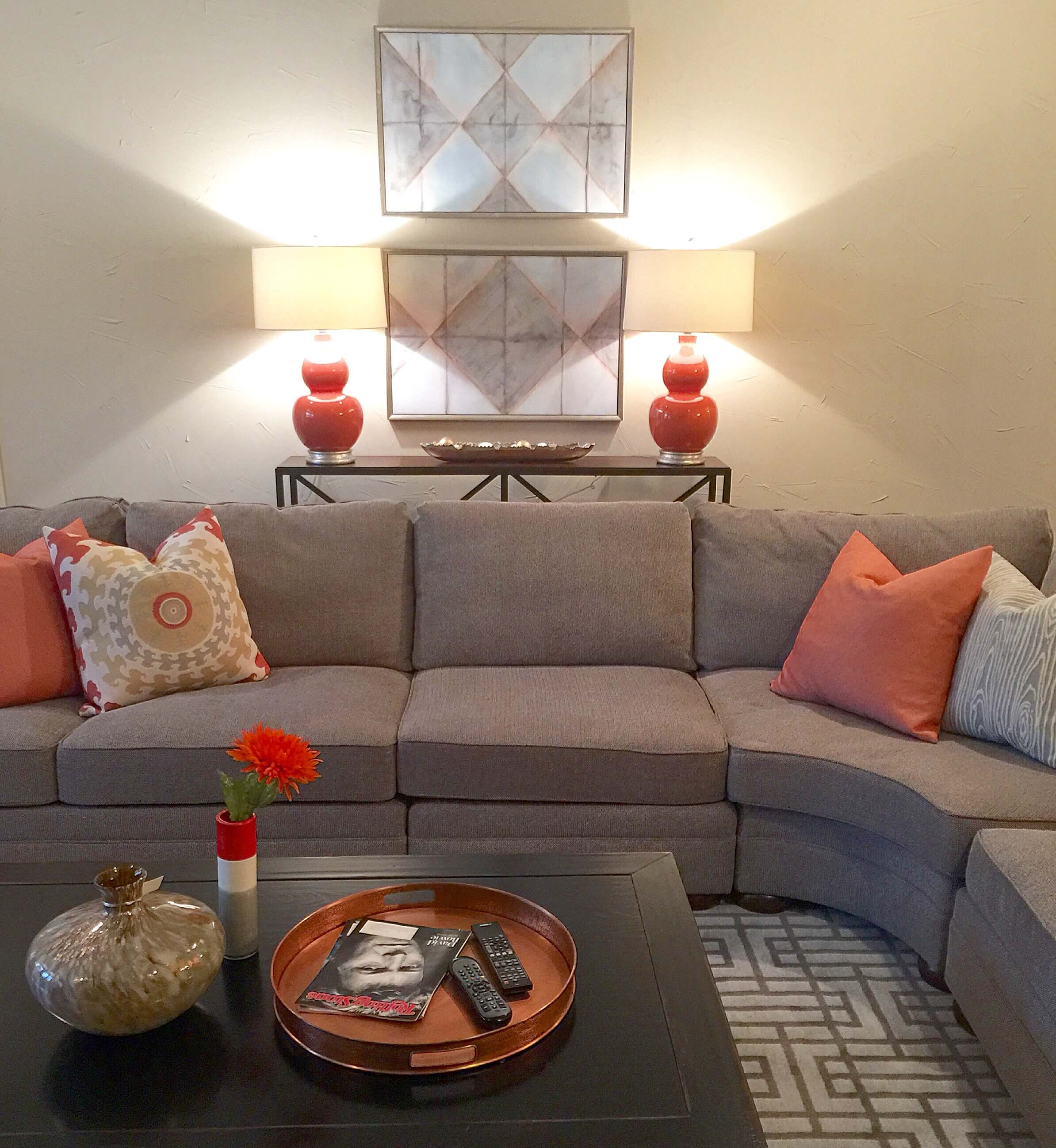 After - bright orange accents in copper, fabrics and lamps | Carla Aston Designer