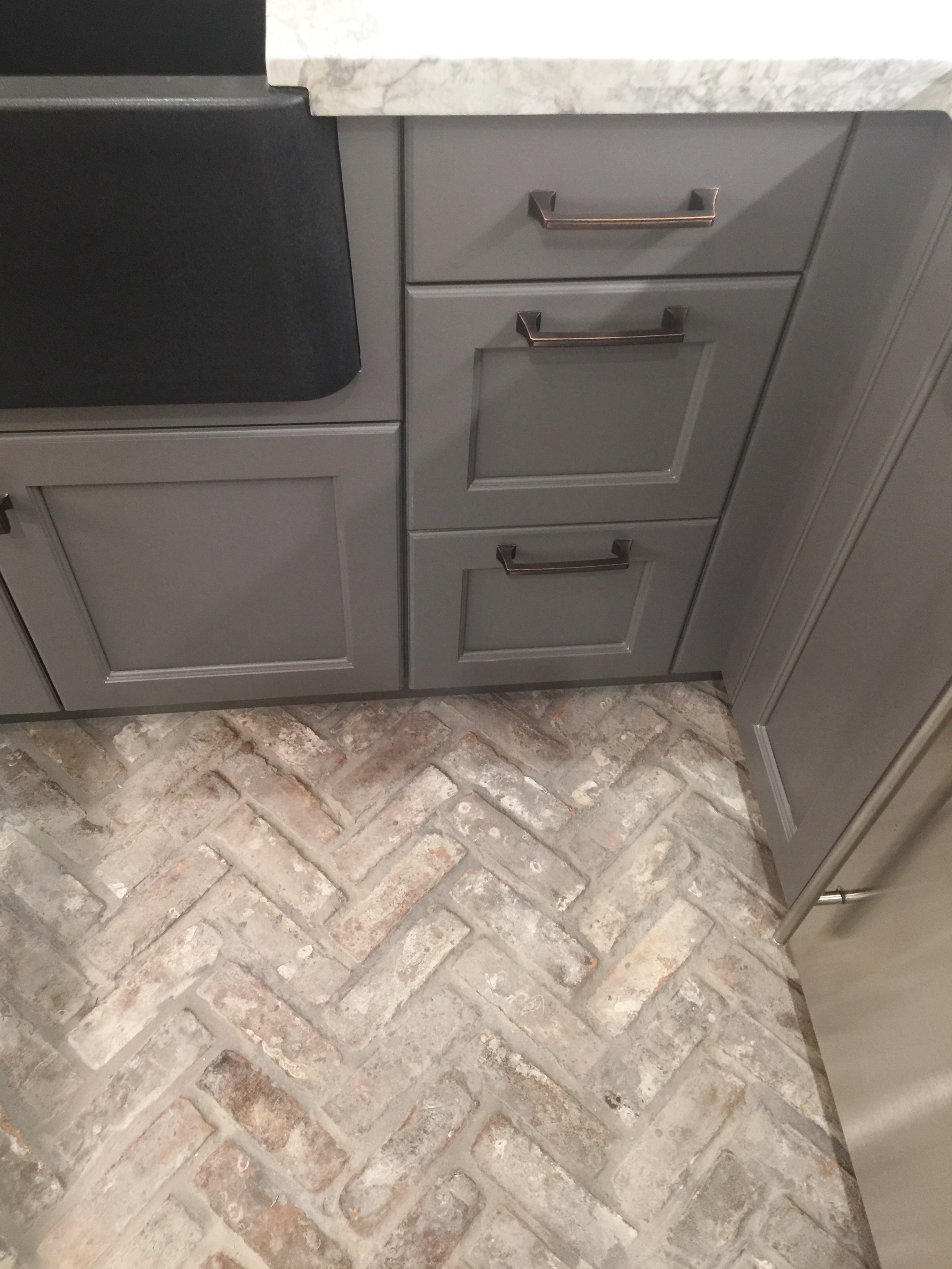 Brick flooring in the butler's pantry - Designer Jamie Haskins