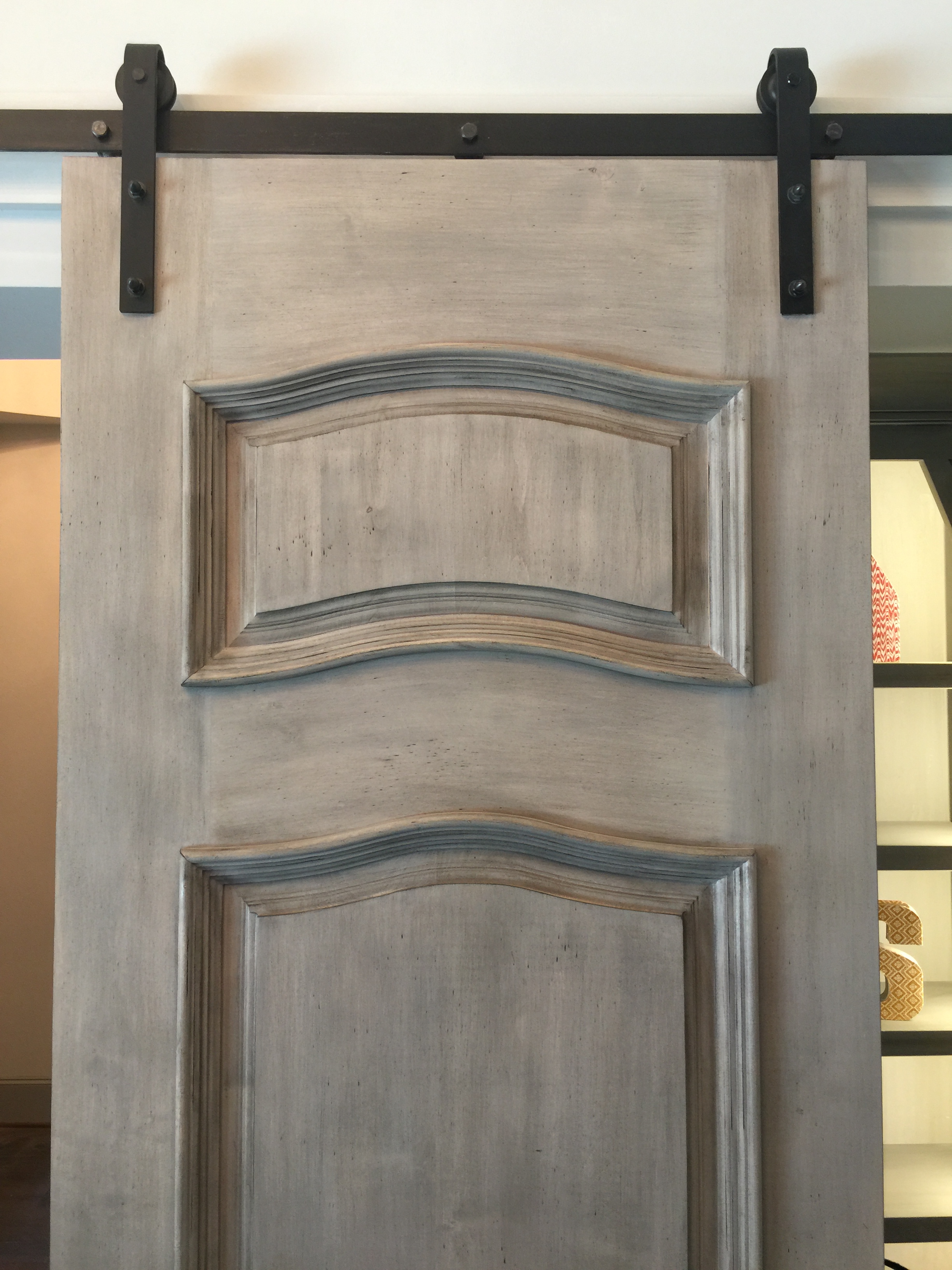 Barn doors in the home office designed by Crystal Reeves